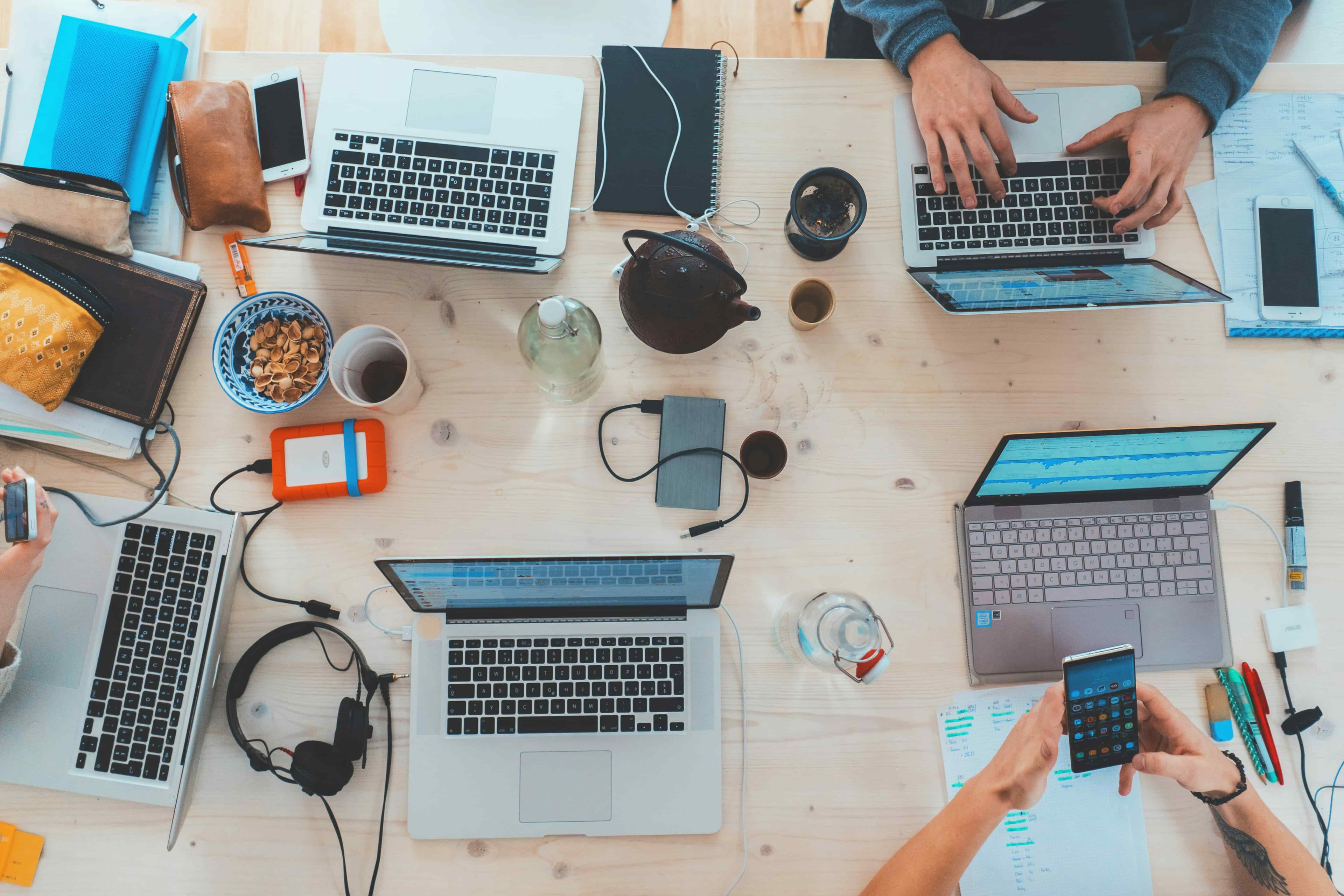 table with laptops